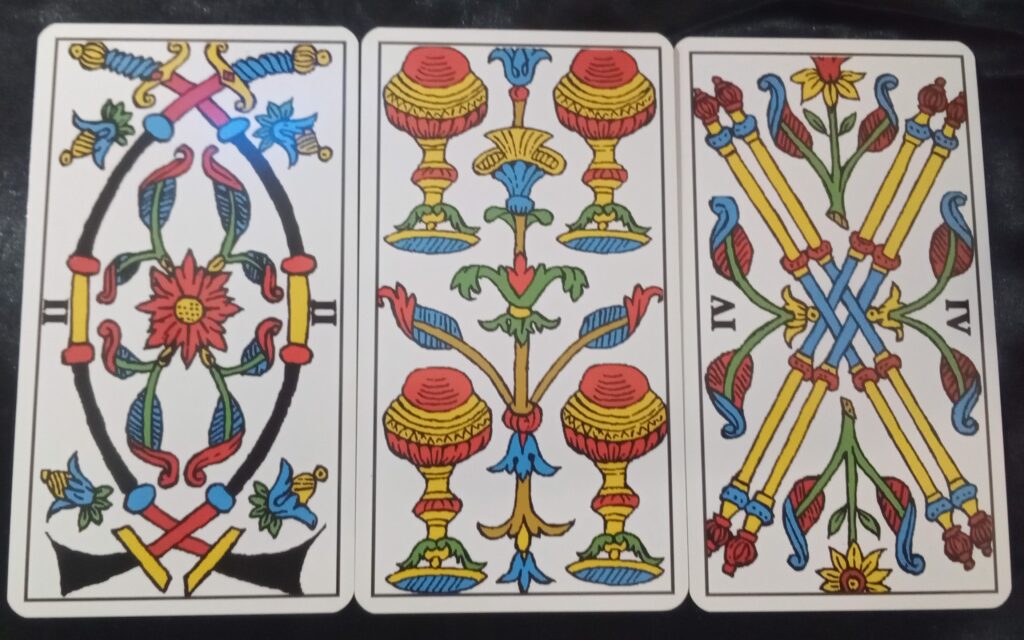 Some numbered cards from the Tarot of Marseille.